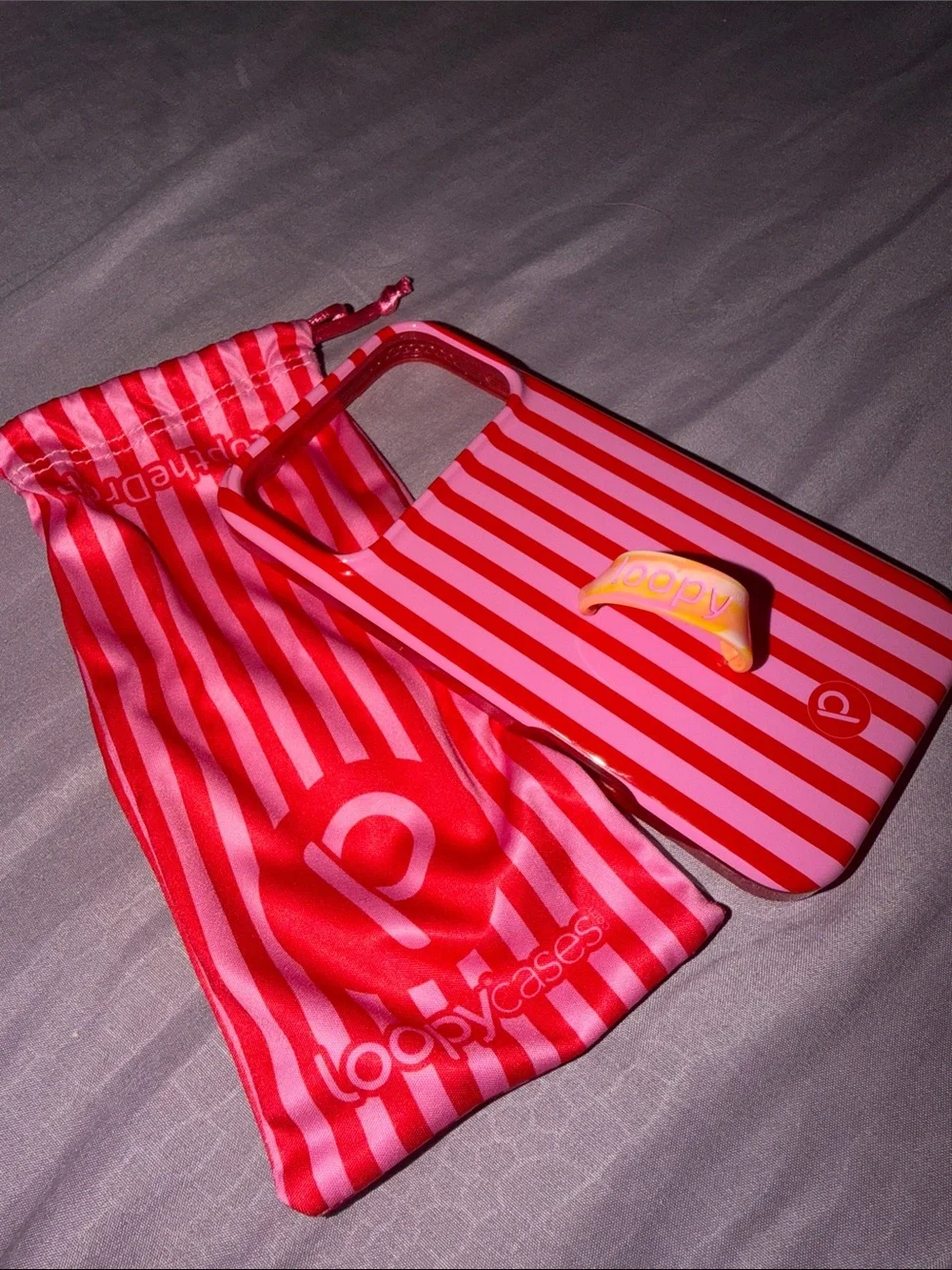 NEW iPhone 17 pro max red and pink striped loopy case with drawstring pouch